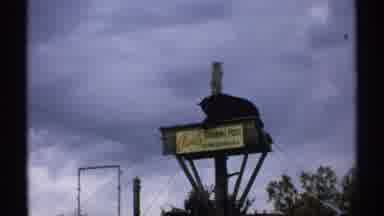 New Hampshire (1971): Bear Lying Down On Wooden Aerial Platform At Clark Trading