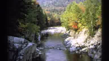 New Hampshire (1971): Scenic View Of Calm Creek Roaring Waterfall With Rocks And