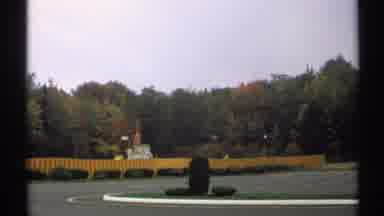 New York (1971): A Beautiful Place Surrounded By Trees And Houses
