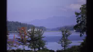 New York (1971): Lake View Of Mountain And Forest Park Woman Holding Cat Standing