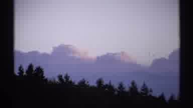 New York (1971): Trees In The Distance With Sky And Clouds Over It