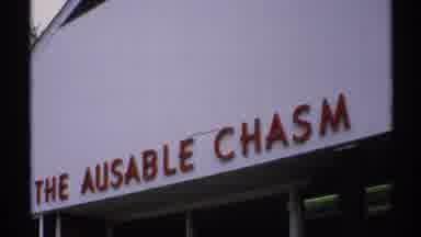 New York (1971): A Huge Name Board Show The Horse Board In The Side Of A Buildings