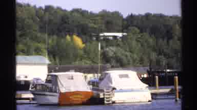 Rollag Minnesota (1971): Yachts And Boats Docked In A Harbor Surrounded By Trees