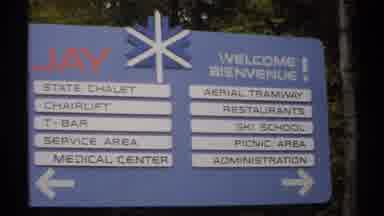 Vermont (1971): Blue Welcome To Biennium Sign Overlooking The Town In Summer