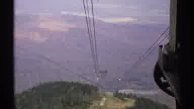 Vermont (1971): A Mountain With Full Of Cables And Green Area Covers Place To