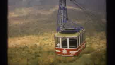 Vermont (1971): Red And White Tram Heading Up The Mountain Shot From Different
