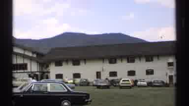 Vermont (1971): View Of Tan And Brown Building On A Clear Day