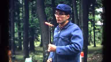 Wisconsin (1971): One Man Drinks Coffee As The Other Oats A Hot Dog Then Checks To