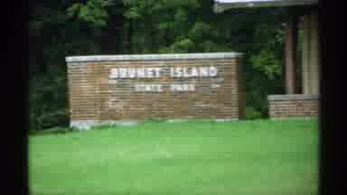 Wisconsin (1971): Stone Sign Of Brunet Island State Park And A Crane