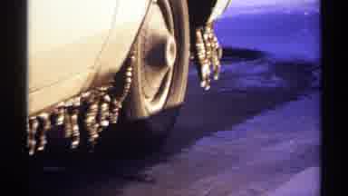 Wisconsin (1971): A Vintage Car Was Shown Outside The Street And Place A Board To