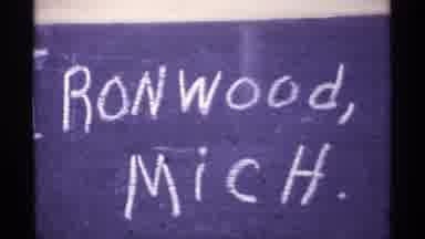 Wisconsin (1971): Snowfall And Street Signs Along The Road In Ironwood