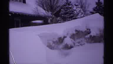 Wisconsin (1971): A Man Is Using A Shovel To Dig His Car Out Of The Snow
