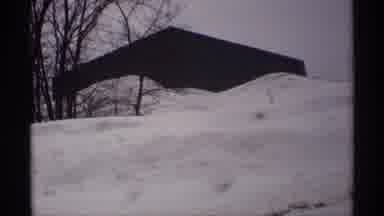 Wisconsin (1971): View Of Snow Covered Cars And Houses On A Clear Winter Day
