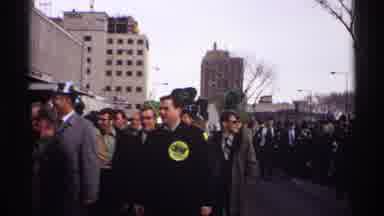 Wisconsin (1971): People Marching In The Street Holding Signs In The City