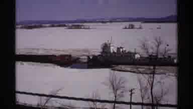 Wisconsin (1971): View Of White Ship Moving Through Icy Water On A Clear Sunny