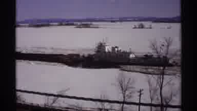 Wisconsin (1971): Ice Breaker Boat Travels Near Steel Bridge In Vintage Footage