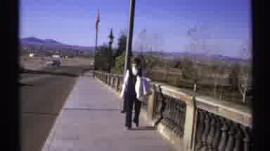Arizona (1972): Man Walks Alone By The Bridge