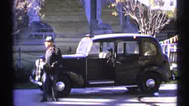 Arizona (1972): A Man Eagerly Watching The Streets With His Car And Moving Around