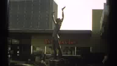 Arizona (1972): A Vintage Statue Stands In A Historical City Your Friends Should