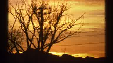 Arizona (1972): The Rooftops During Sunset