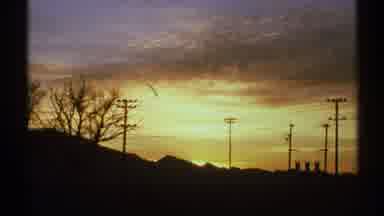 Arizona-1972: Desert Sunrise and Train Journey on Railway Tracks