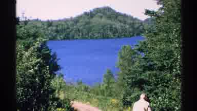 Isle Royale Michigan (1972): Footage Of Lake Landscape With Trees And A Person