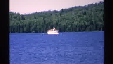 Isle Royale Michigan (1972): Group Of People Gathering On A Dock To Get On A Boat