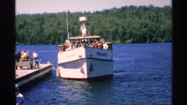 Isle Royale Michigan (1972): Boat Gently Eases In Towards Wooden Dock And