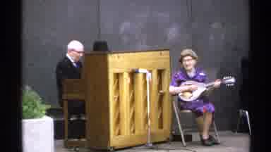 Isle Royale Michigan (1972): Elderly Male And Female Musicians Play Music On A