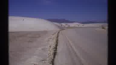 New Mexico (1972): Large Frozen Snow-Covered Roadway In Mountainous Hilly Area