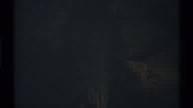 New Mexico (1972): View Of Detailed Column Artwork In A Dimly Lit Room