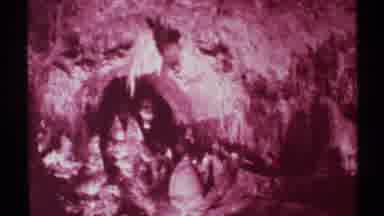 New Mexico (1972): People Walking Inside A Cave Showing Stalagmites And
