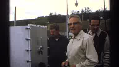 North Dakota (1972): A Few Men In The Middle Of The Huge Buildings And Planning