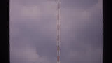 North Dakota (1972): Strange High Red And White Building With Clouds In The