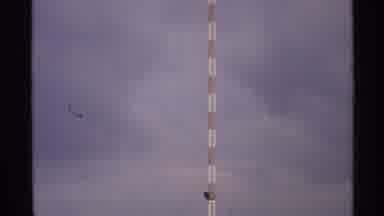 North Dakota (1972): Red And White Structure Goes Up Into The Sky And Towers Of