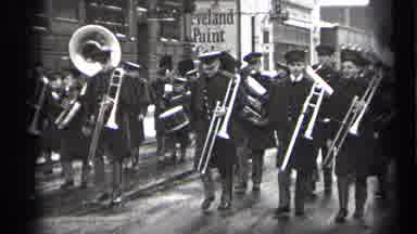 Cleveland Ohio-1937: Marching Band in Black Coats Walking Down Street