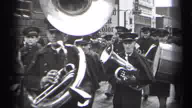 Cleveland Ohio-1937: A Marching Band Parading Through the Streets Playing Brass Instruments