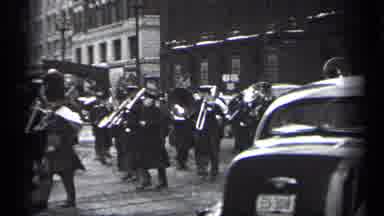 Cleveland Ohio (1937): A Band And Honor Guard Marching Down A Parade Route In An