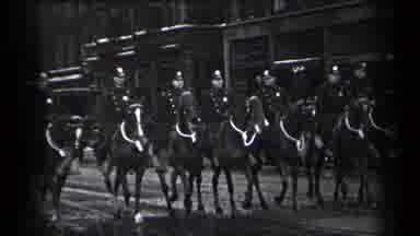 Cleveland Ohio (1937): People Riding Horses Down The Road In A Line