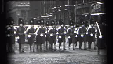 Cleveland Ohio (1937): British Guards March Down The Cobblestone Road Together In