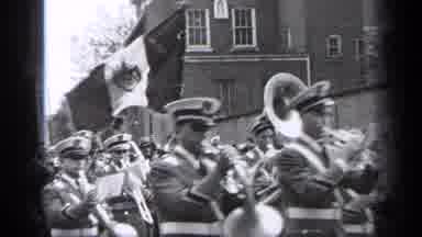 Cleveland Ohio (1937): Brass Marching Band Marches Down Street On A Cloudy Day