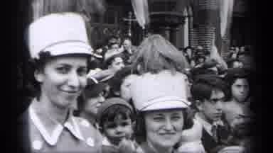Cleveland Ohio (1937): People In Band Uniforms Stand Next To People In A Different
