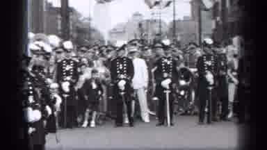 Cleveland Ohio (1937): A Team Playing In The Middle Of The Street And Band Was