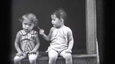 Cleveland Ohio (1937): Two Cute Toddlers Sitting And Sharing Food Kicking Legs