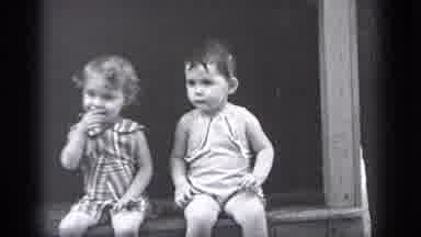 Cleveland Ohio (1937): Two Toddlers In Black And White Sitting On Some Sort Of