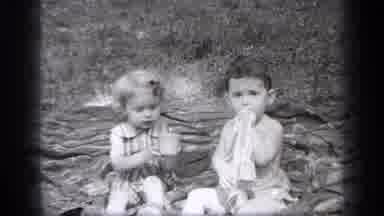 Cleveland Ohio (1937): Girl And Boy Sitting On The Ground