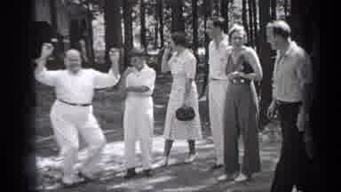 Cleveland Ohio (1937): Happy Middle Aged Man Dancing Outdoors At Picnic With Group
