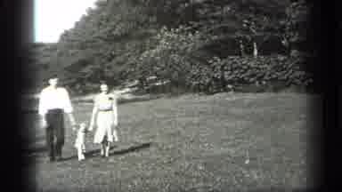Cleveland Ohio (1938): Family Walking And Skipping Hand In Hand Outside Across