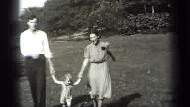 Cleveland Ohio (1938): Man And Woman Playing In Field With Young Girl Near Trees