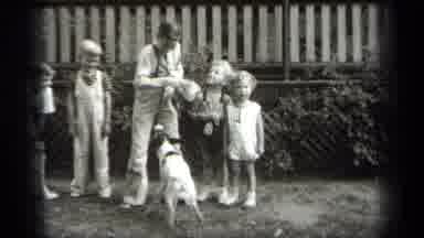 Cleveland Ohio (1938): A Group Of Children Playing With The Dog And Elderly Boy